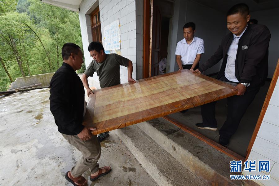 （新華全媒+）（7）千里“挪窩”，踏實開啟新生活