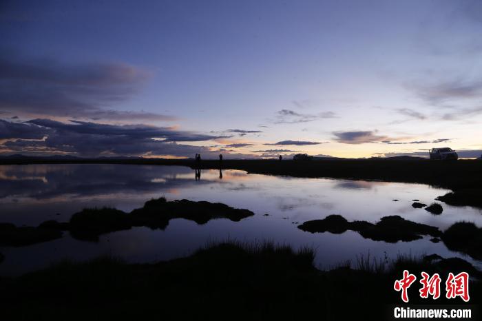 圖為夕陽下的查旦濕地?！●R銘言 攝