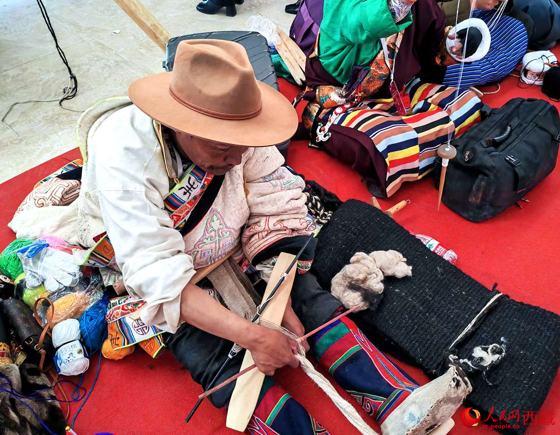 編織技能展示。人民網(wǎng) 李海霞攝